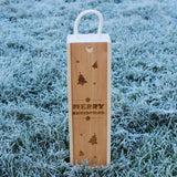 Personalised Christmas wooden wine gift box engraved with stars, trees and baubles