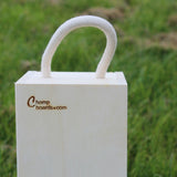 Top of a single wooden wine gift box with rope handle and engraved Chompboards logo