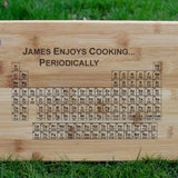 Periodic Table chopping board personalised with a name and 'enjoys cooking periodically'